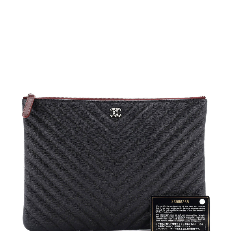 O Case Clutch Chevron Caviar Medium