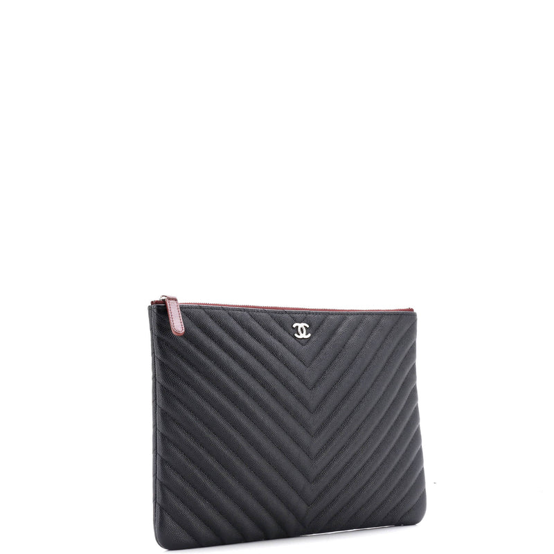 O Case Clutch Chevron Caviar Medium