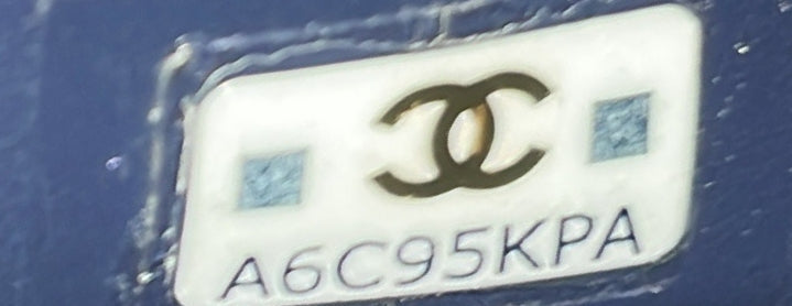 Twist Your Buttons Drawstring Bucket Bag