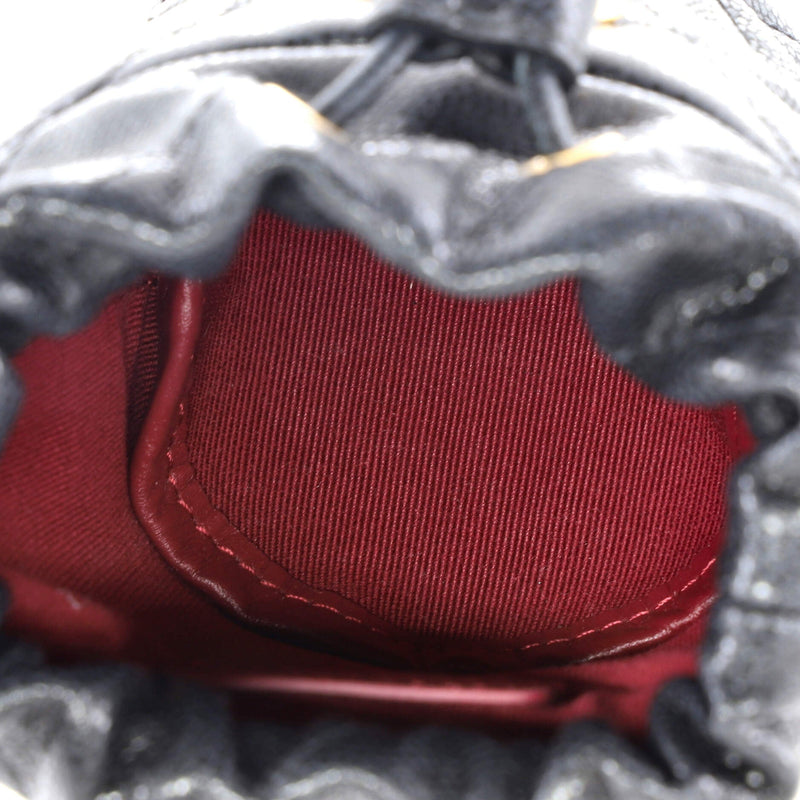 Twist Your Buttons Drawstring Bucket Bag