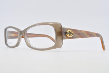 Gucci Eyeglasses 0L7E Opal Brown Size