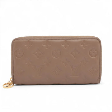 Louis Vuitton Embossed Cuff Zippy Wallet