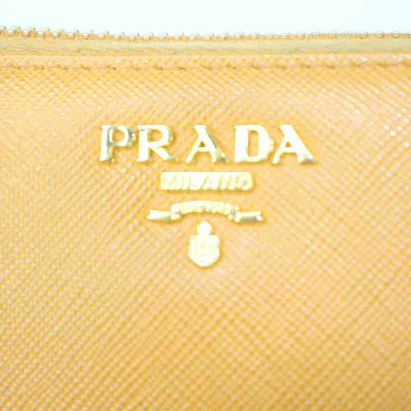 Pre-loved authentic Prada Zippy Wallet Orange Leather sale at jebwa.