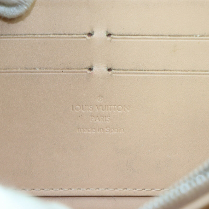 Pre-loved authentic Louis Vuitton Sarah Beige Zipper sale at jebwa