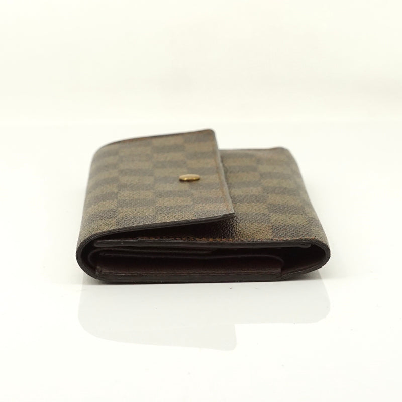 Pre-loved authentic Louis Vuitton Porte Tresor sale at jebwa.