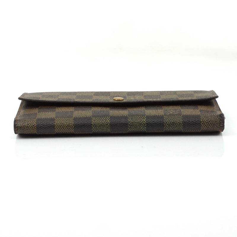 Pre-loved authentic Louis Vuitton Porte Tresor sale at jebwa.