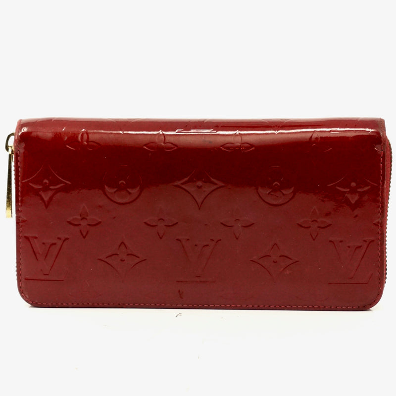 Pre-loved authentic Louis Vuitton Zippy Wallet Pomme sale at jebwa
