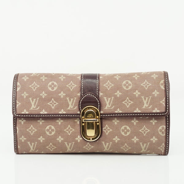 Pre-loved authentic Louis Vuitton Portefeuille Sarah sale at jebwa