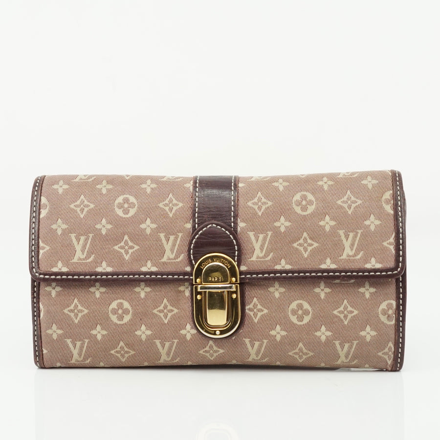 Pre-loved authentic Louis Vuitton Portefeuille Sarah sale at jebwa