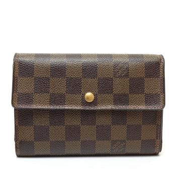Pre-loved authentic Louis Vuitton Porte Tresor Wallet sale at jebwa