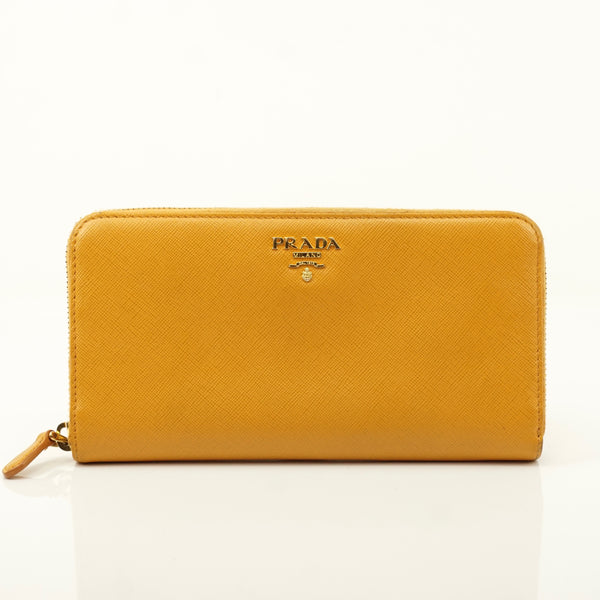 Pre-loved authentic Prada Zippy Wallet Orange Leather sale at jebwa.