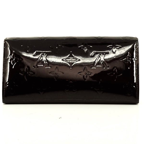 Pre-loved authentic Louis Vuitton Portefeuille Sarah sale at jebwa