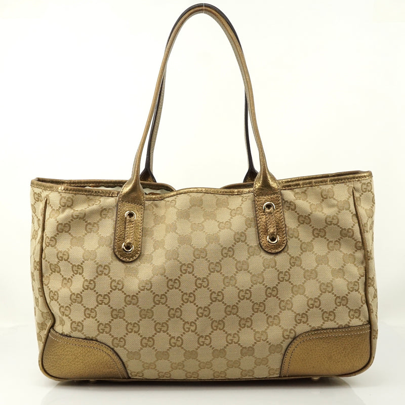 Pre-loved authentic Gucci Gg Hand Bag Canvas Tote Gold sale at jebwa