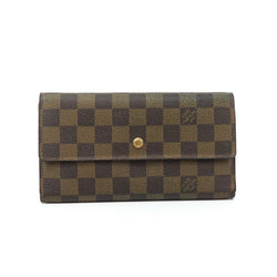 Pre-loved authentic Louis Vuitton Porte Tresor sale at jebwa.