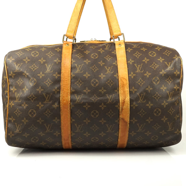 Pre-loved authentic Louis Vuitton Sac Souple 45 Travel sale at jebwa