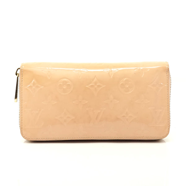 Pre-loved authentic Louis Vuitton Zippy Wallet Pink sale at jebwa.