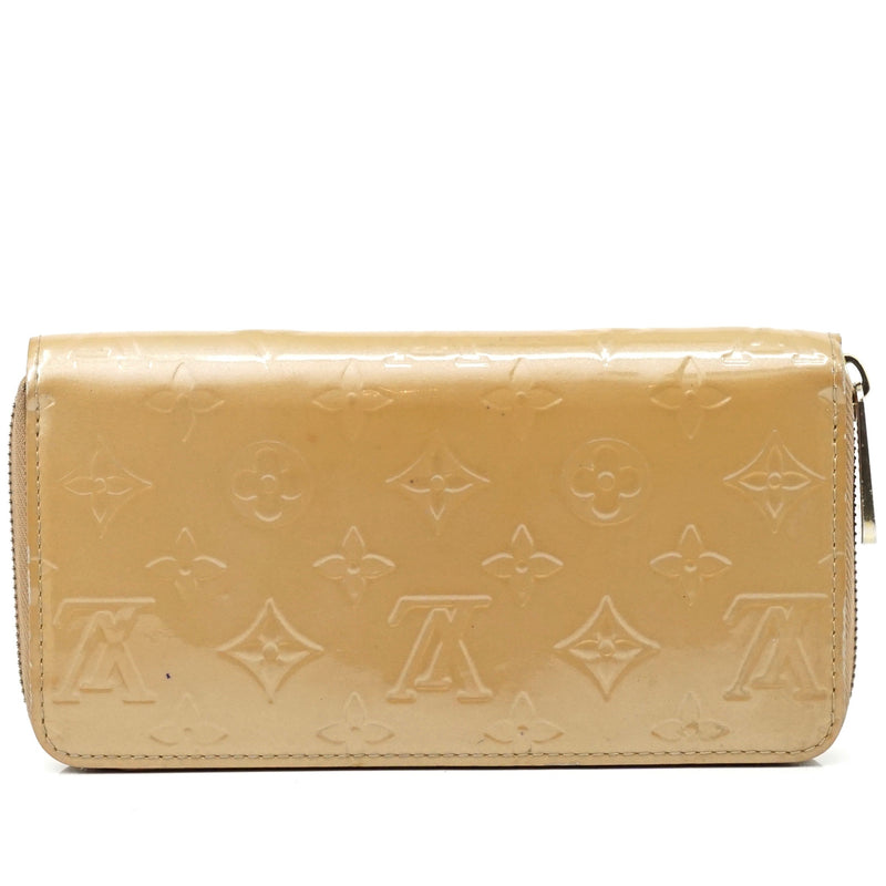 Pre-loved authentic Louis Vuitton Sarah Beige Zipper sale at jebwa