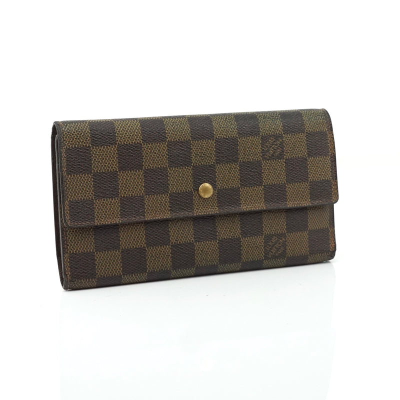 Pre-loved authentic Louis Vuitton Porte Tresor sale at jebwa.