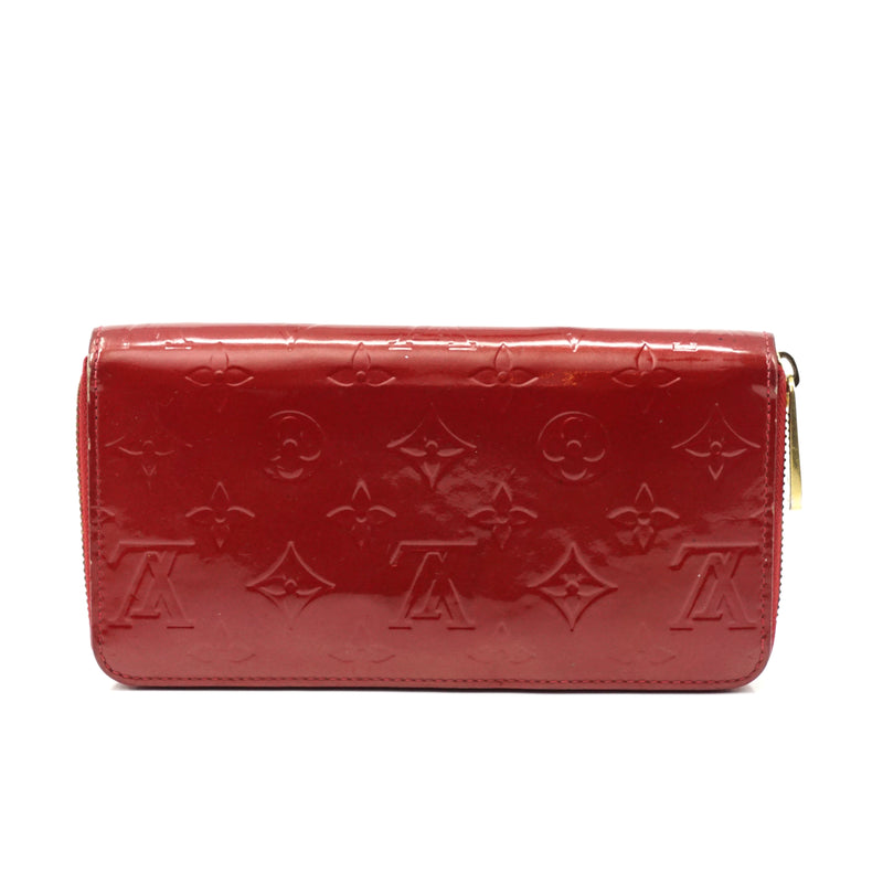 Pre-loved authentic Louis Vuitton Zippy Wallet Red sale at jebwa.