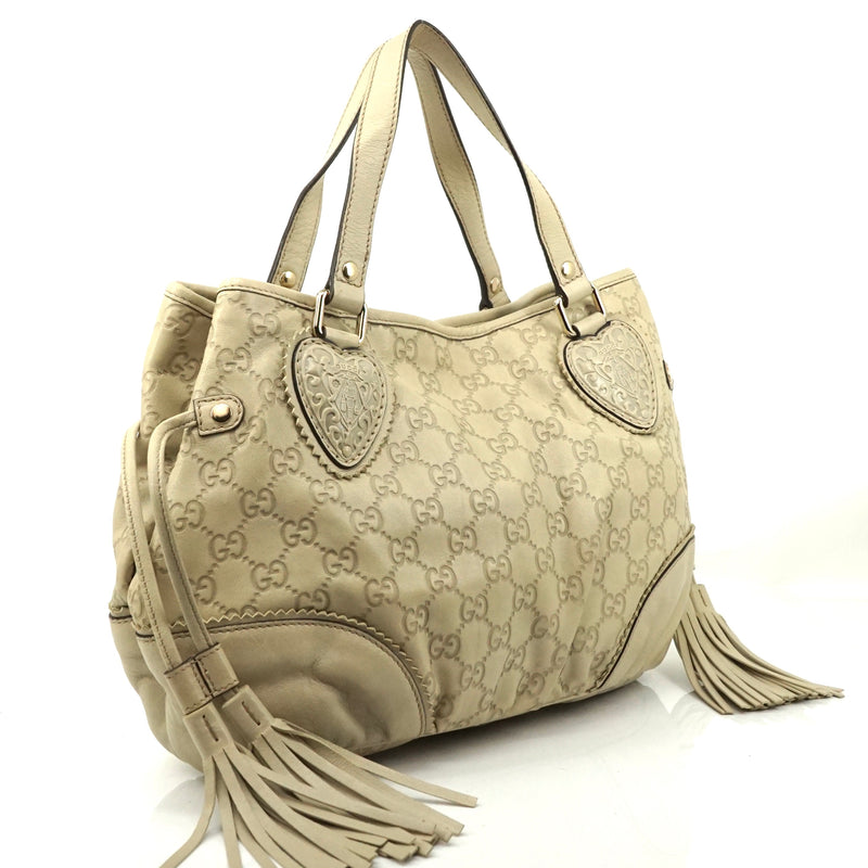 Pre-loved authentic Gucci Guccissima Tassel Tote Bag sale at jebwa.