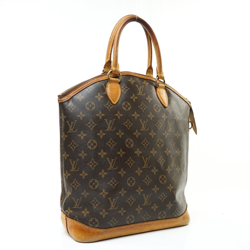 Pre-loved authentic Louis Vuitton Lockit Vertical Hand sale at jebwa.