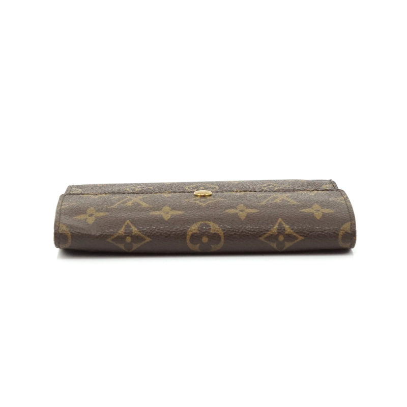 Pre-loved authentic Louis Vuitton Porte Tresor Wallet sale at jebwa.