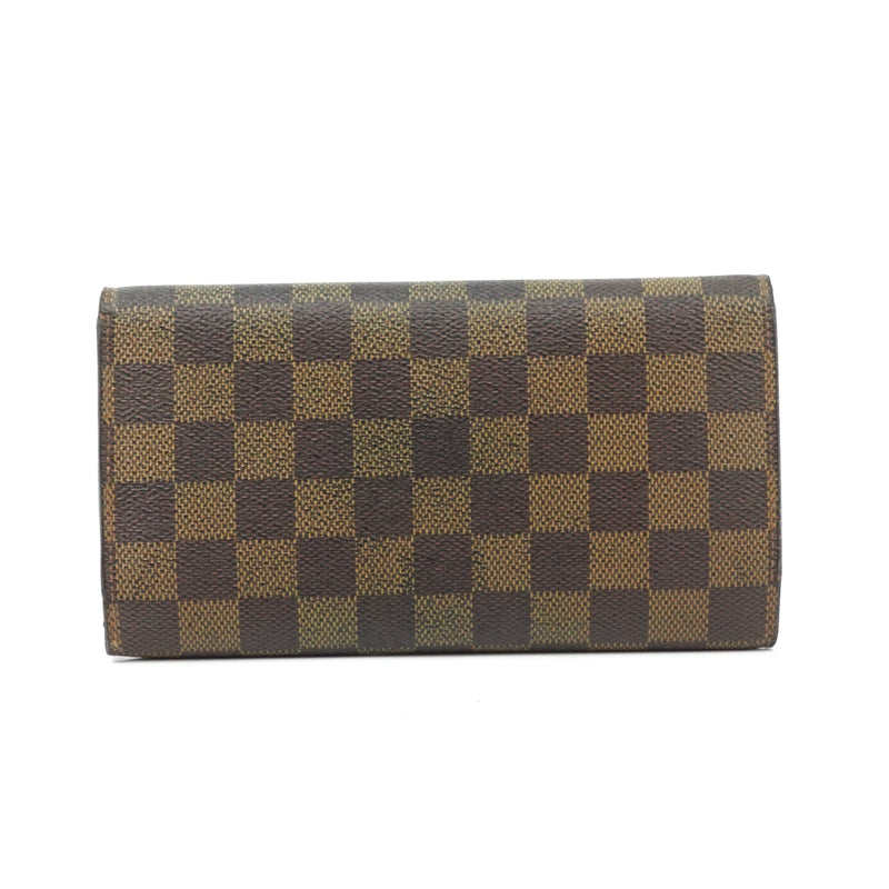 Pre-loved authentic Louis Vuitton Porte Tresor sale at jebwa.