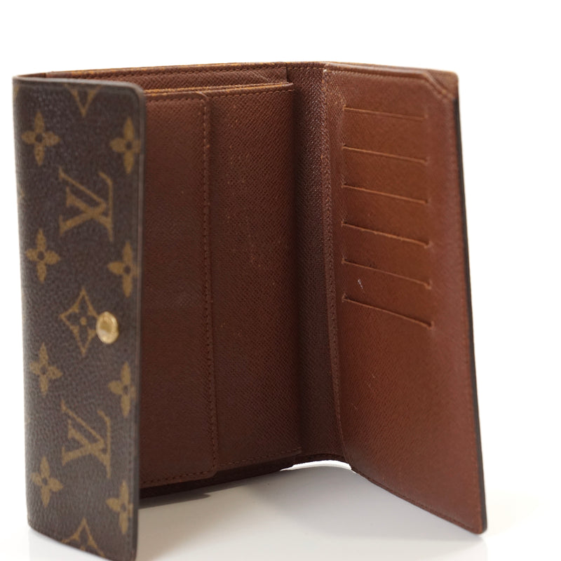 Pre-loved authentic Louis Vuitton Porte Tresor Wallet sale at jebwa.