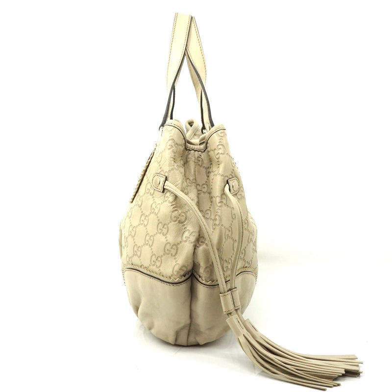 Pre-loved authentic Gucci Guccissima Tassel Tote Bag sale at jebwa.