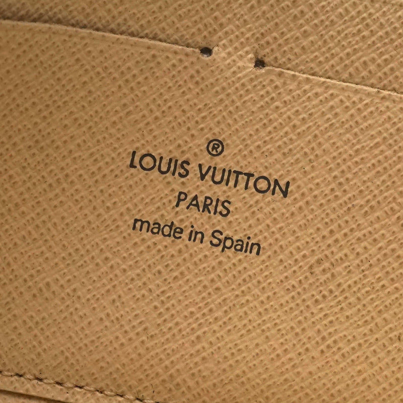 Pre-loved authentic Louis Vuitton Zippy Wallet White sale at jebwa