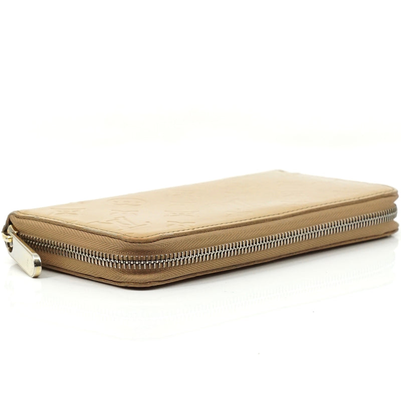 Pre-loved authentic Louis Vuitton Sarah Beige Zipper sale at jebwa