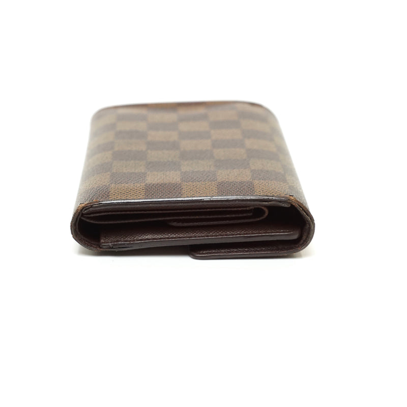 Pre-loved authentic Louis Vuitton Porte Tresor Wallet sale at jebwa