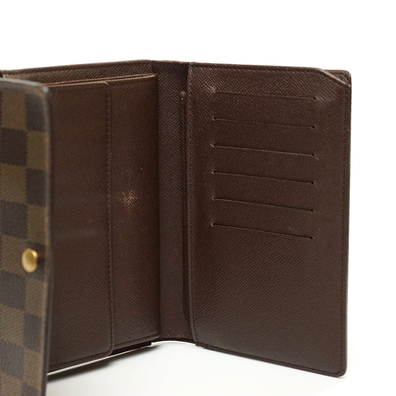 Pre-loved authentic Louis Vuitton Porte Tresor Wallet sale at jebwa