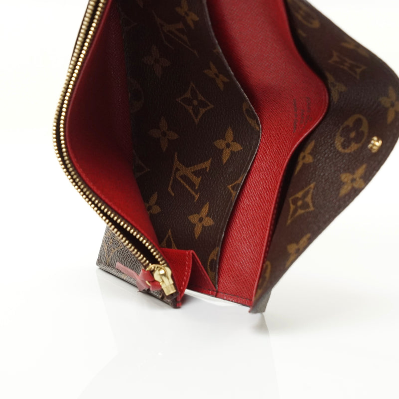 Pre-loved authentic Louis Vuitton Portefeuille Emilie sale at jebwa
