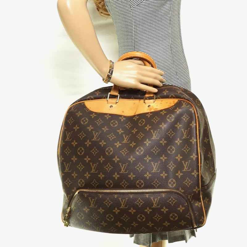 Pre-loved authentic Louis Vuitton Evasion Travel Bag sale at jebwa