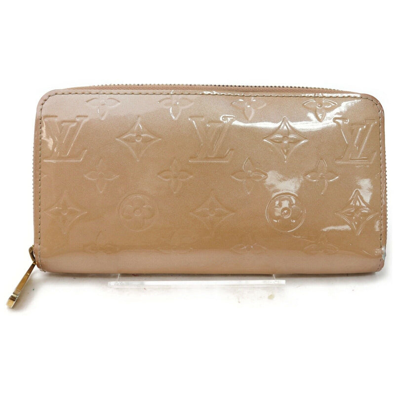 Pre-loved authentic Louis Vuitton Zippy Wallet Beige sale at jebwa