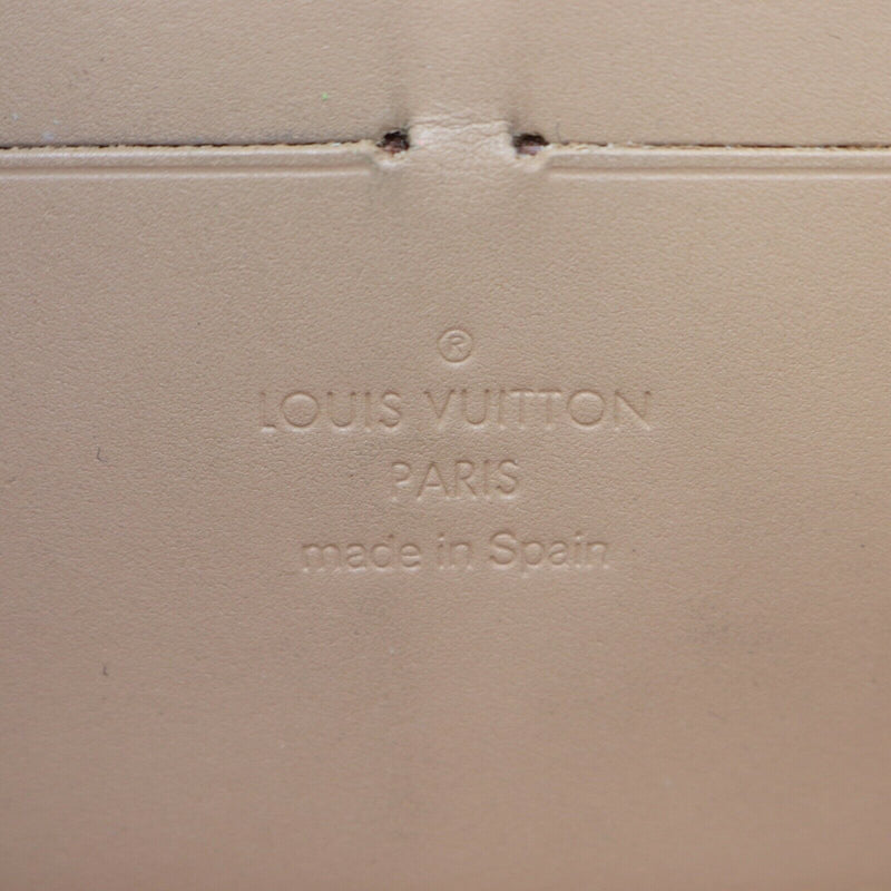 Pre-loved authentic Louis Vuitton Zippy Wallet Beige sale at jebwa