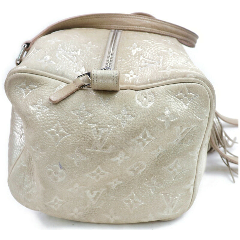Pre-loved authentic Louis Vuitton Comete Shimmer sale at jebwa