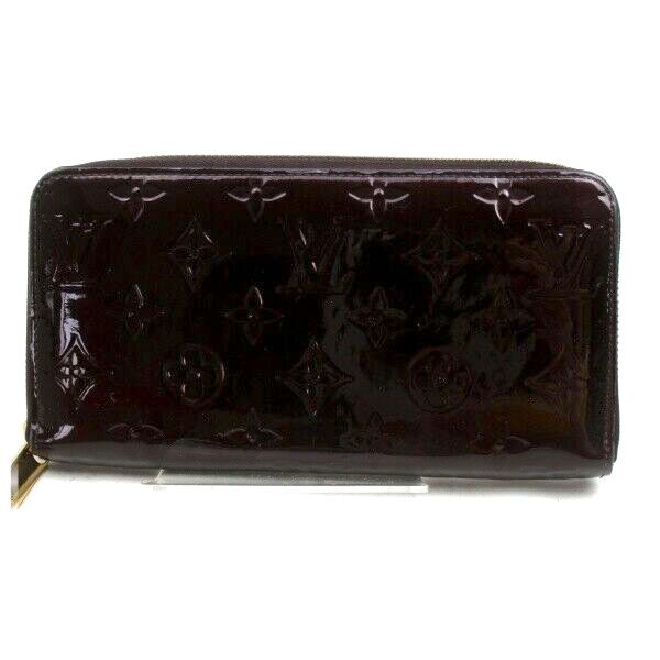 Pre-loved authentic Louis Vuitton Zippy Wallet Purple sale at jebwa