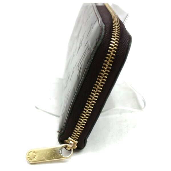 Pre-loved authentic Louis Vuitton Zippy Wallet Purple sale at jebwa