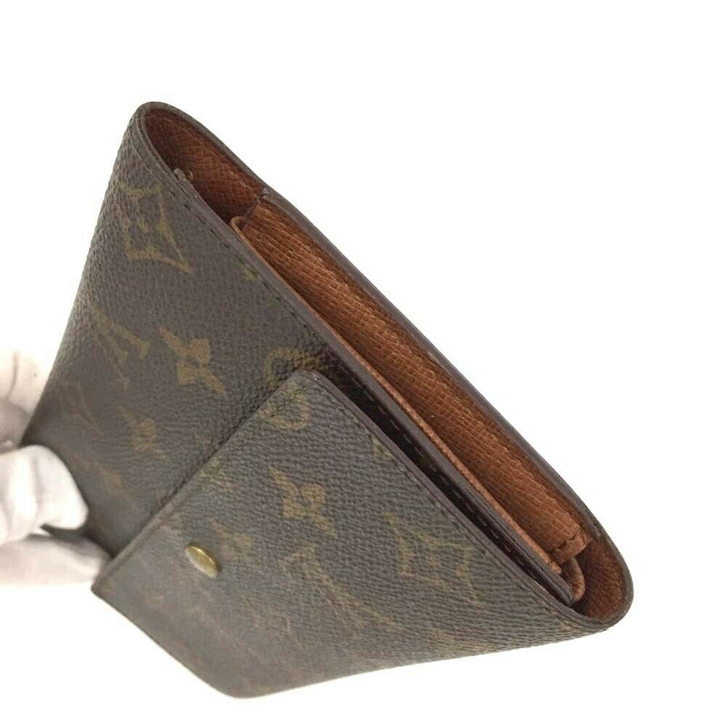 Pre-loved authentic Louis Vuitton Porte Tresor Long sale at jebwa
