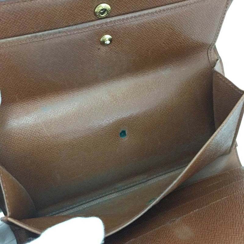 Pre-loved authentic Louis Vuitton Porte Tresor Long sale at jebwa
