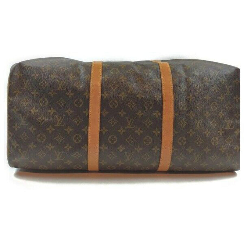 Pre-loved authentic Louis Vuitton Sac Souple 55 Travel sale at jebwa