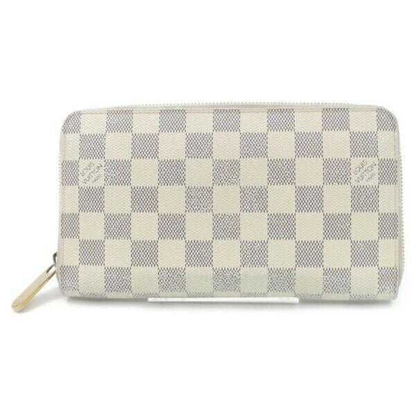 Pre-loved authentic Louis Vuitton Zippy Wallet White sale at jebwa