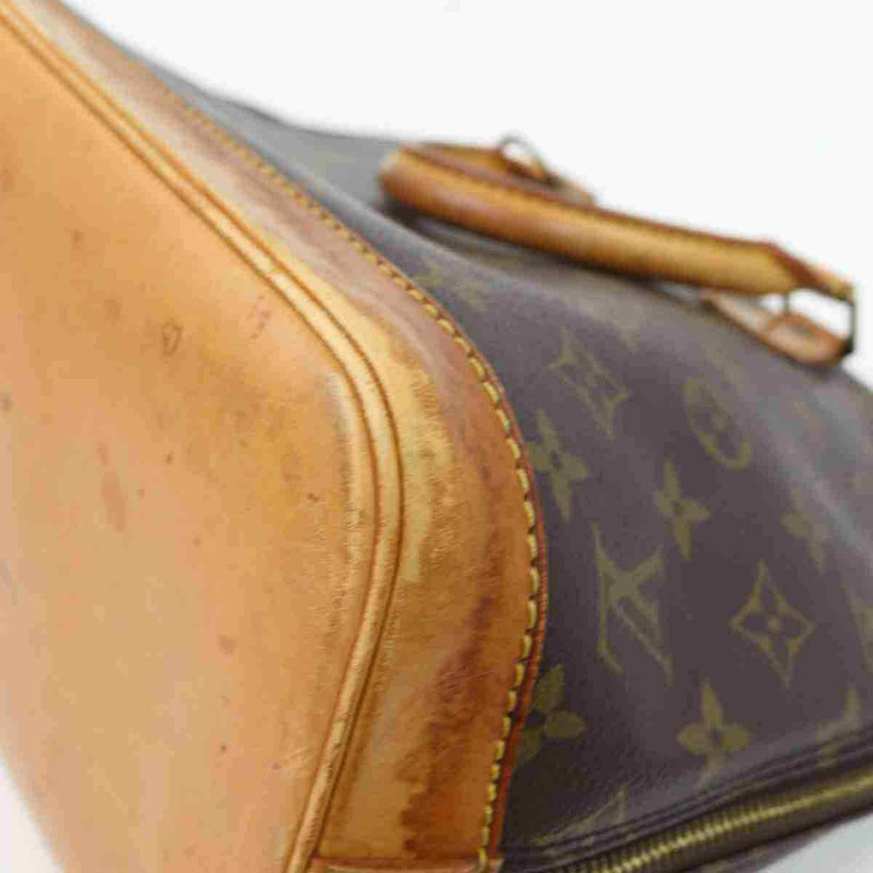 Pre-loved authentic Louis Vuitton Alma Hand Bag Brown sale at jebwa
