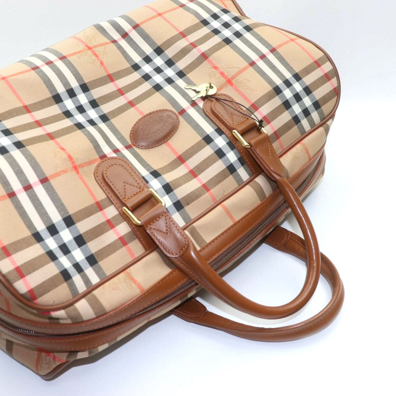 Pre-loved authentic Burberry Boston Bag Brown Canvas sale at jebwa
