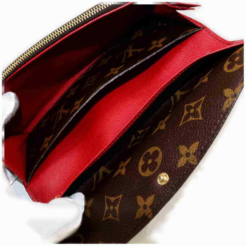 Pre-loved authentic Louis Vuitton Portefeuille Emilie sale at jebwa