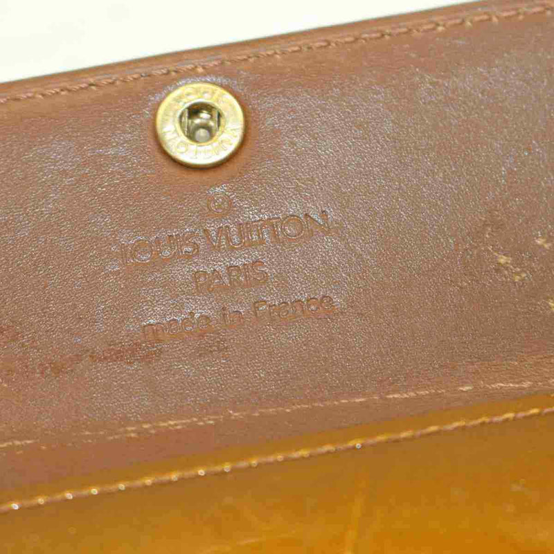 Pre-loved authentic Louis Vuitton Ludlow Wallet Brown sale at jebwa