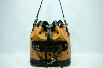 Pre-loved authentic Mcm Cognac Visetos Drawstring sale at jebwa