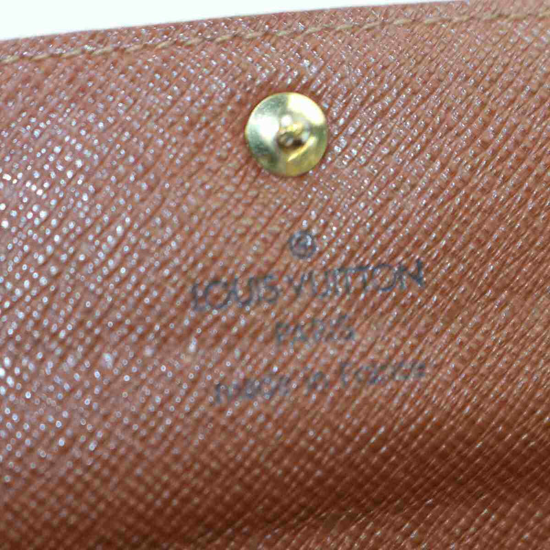 Pre-loved authentic Louis Vuitton Pochette Monnaie Long sale at jebwa
